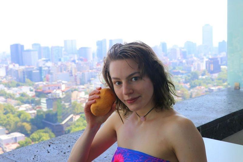 Meresha-press-photo-holding-a-fruit.jpeg